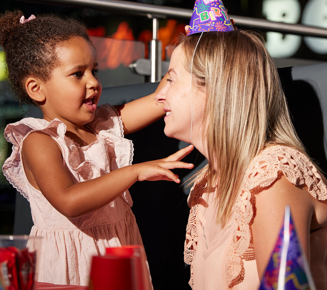 Woman and girl at a party